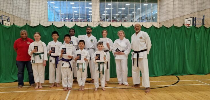 Instructors in group photo of students who graded